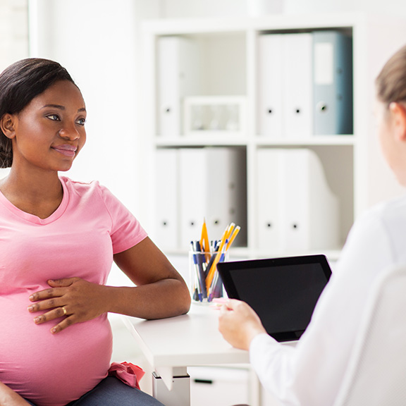Pregnant woman at doctor